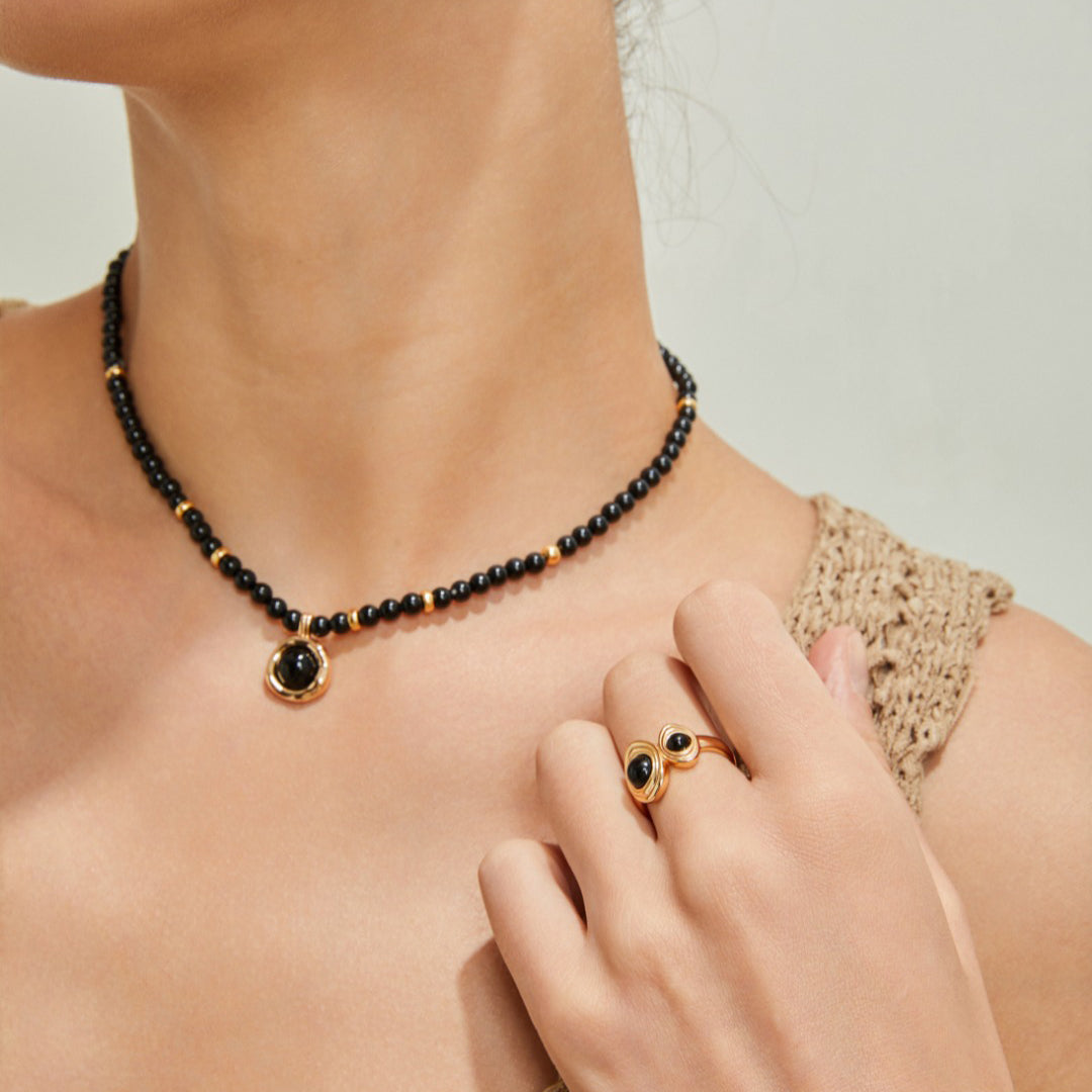 S925 Gold-Tone Double Black Onyx Ring in Ribbed Oval Bezels