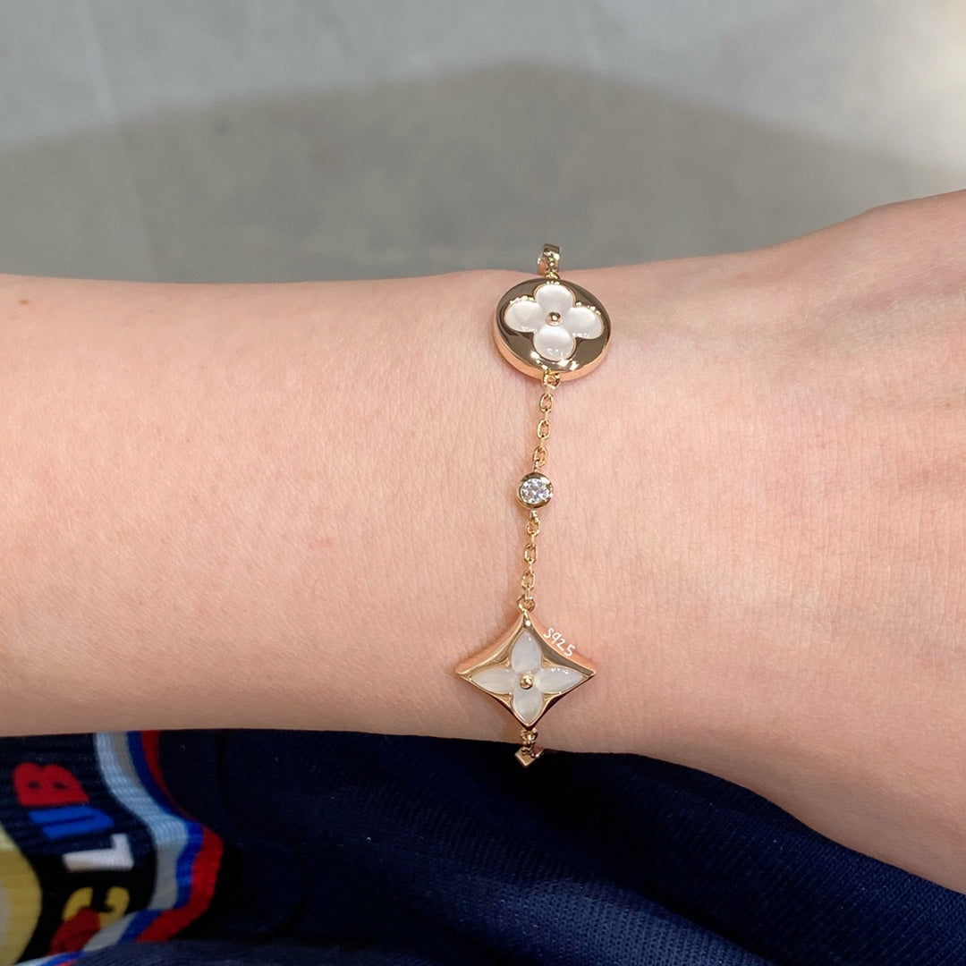 [Vicky]STAR AND SUN 4 MOTIF WHITE MOP PINK GOLD BRACELET
